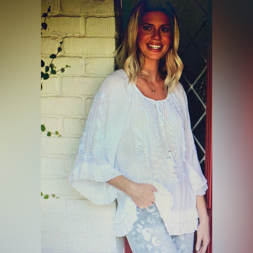 white breezy top, brand new with tags, purchased from Dillard’s.